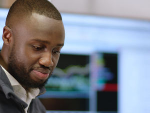 Male mechanical engineer designs electric vehicles
