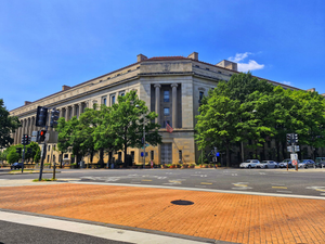 A large building sitting on the corner of a street