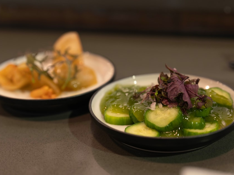 a couple of plates of food on a table