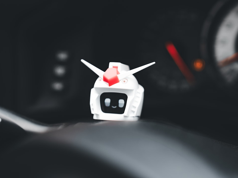 A close up of a car dashboard with a speedometer