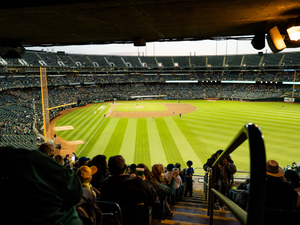 a football stadium with people in the stands