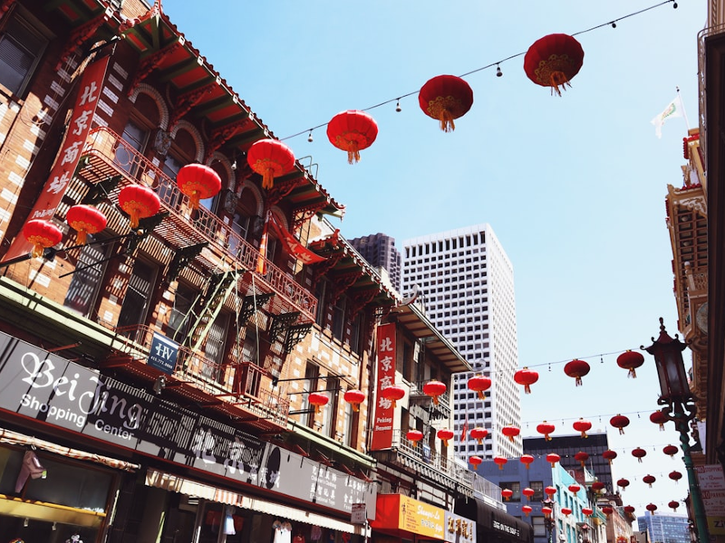 Chinatown street is adorned with red lanterns.