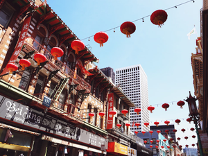 Chinatown street is adorned with red lanterns.