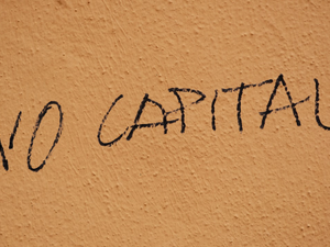The word no capital written on a wall