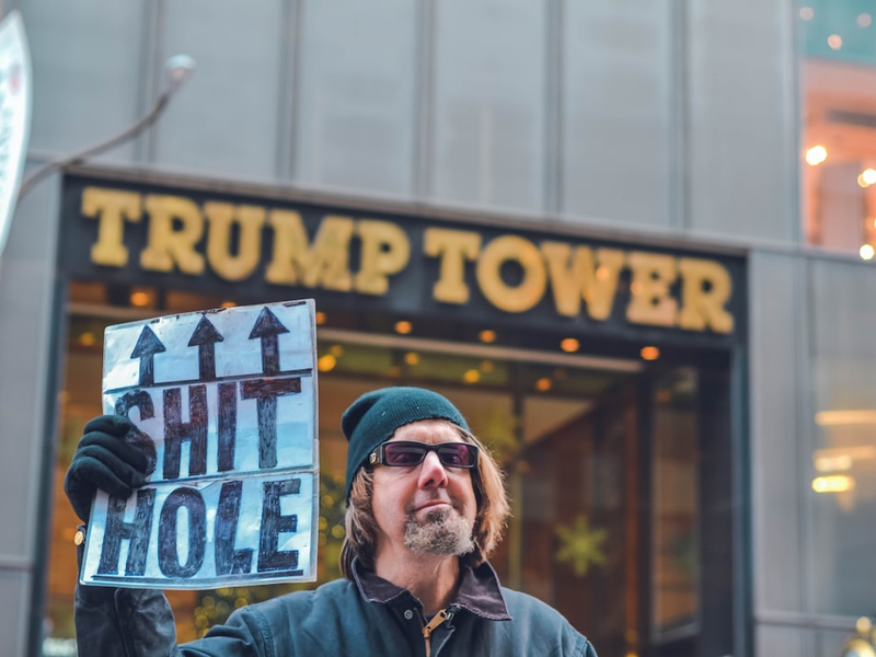 man standing near Trump Tower