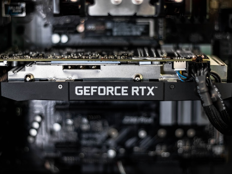 selective focus photography of GEFORCE RTX graphics card