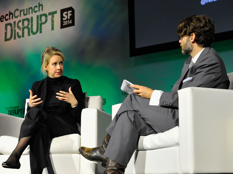 Theranos Chairman, CEO and Founder Elizabeth Holmes (L) and TechCrunch Writer and Moderator Jonathan Shieber speak onstage at TechCrunch Disrupt at Pier 48 on September 8, 2014 (14995888227)