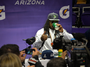 Marshawn Lynch works the crowd