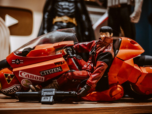 a close up of a toy motorcycle on a table