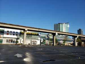 white and brown concrete building near road during daytime