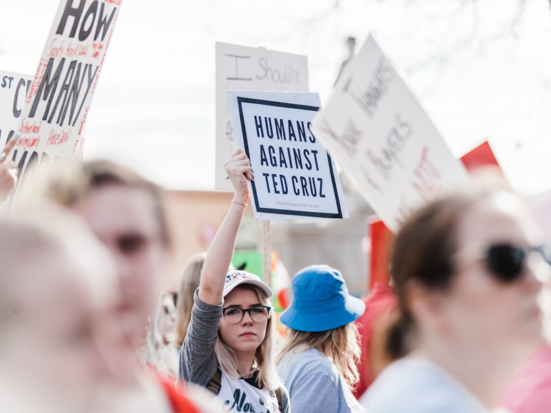 A North Texas student protests against Ted Cruz at the March for Our Lives sister rally in Denton, Texas on March 24th, 2018.