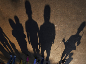 a group of people standing next to each other