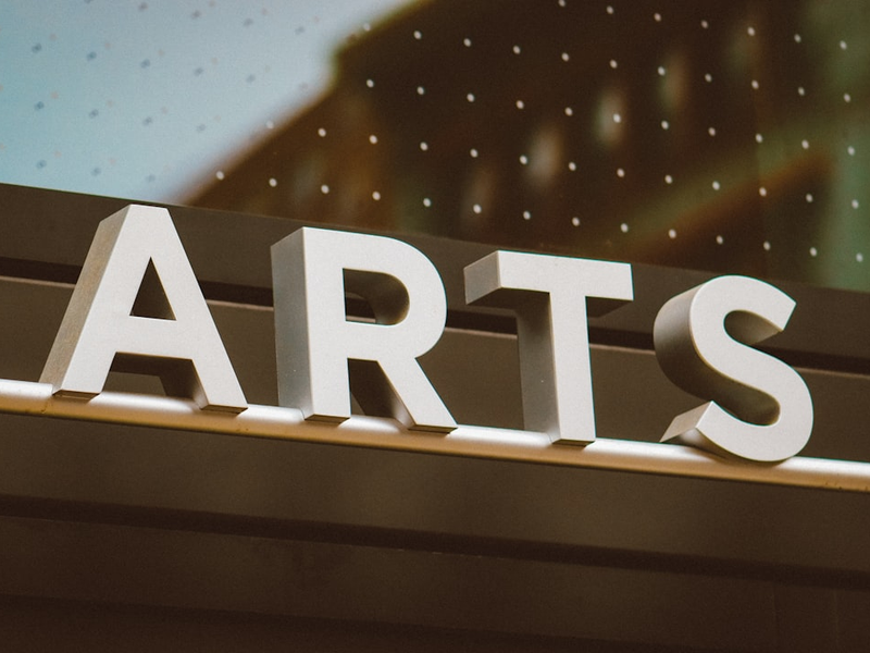 The word "arts" in bold letters.