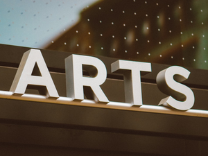 The word "arts" in bold letters.