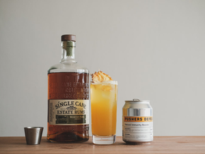 Pushers craft brews - The Defender being poured and mixed into a refreshing cocktail with aged rum.