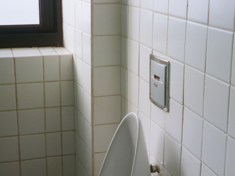 a urinal in a bathroom