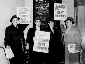 Men protest against rent increases and call for rent control