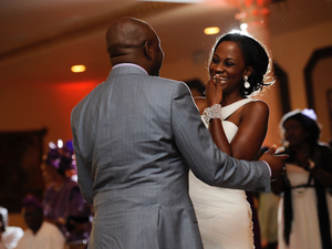 a bride and groom dancing at a wedding reception