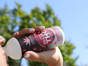a person holding a can