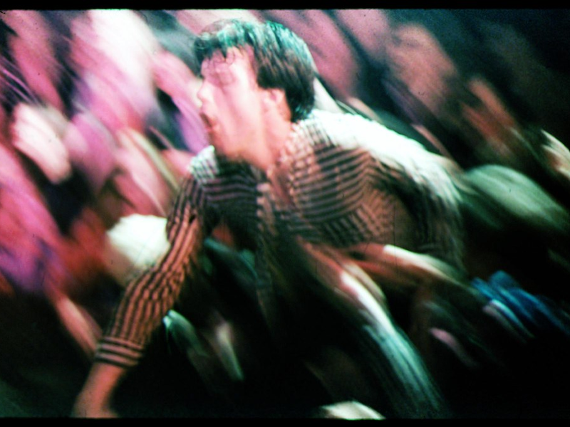 Lux Interior of The Cramps, dives into the audience at Mabuhay Gardens, San Francisco, 1978.