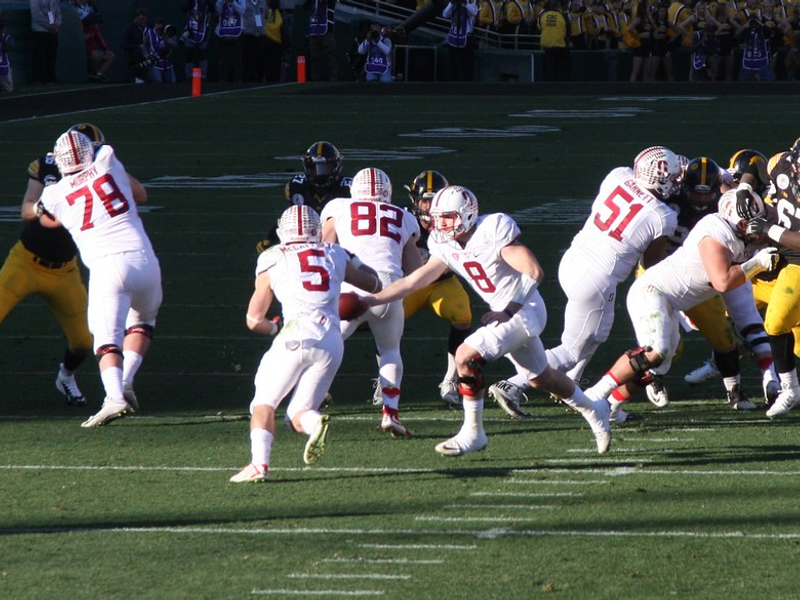 Kevin Hogan Hands Off to Christian McCaffrey