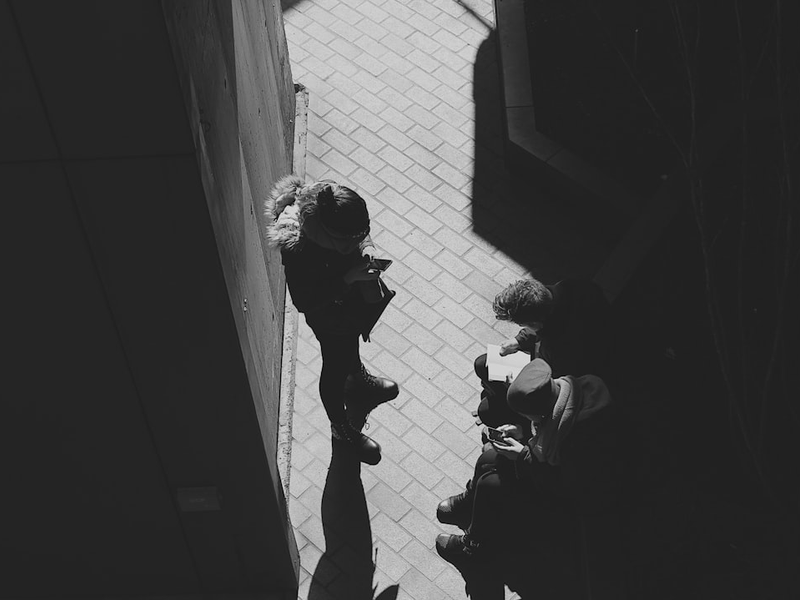 a couple of people standing next to each other