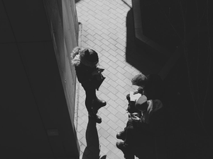 a couple of people standing next to each other