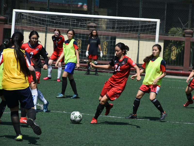 girls playing soccer