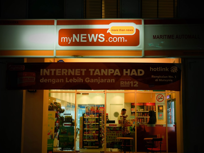 a store front with a sign