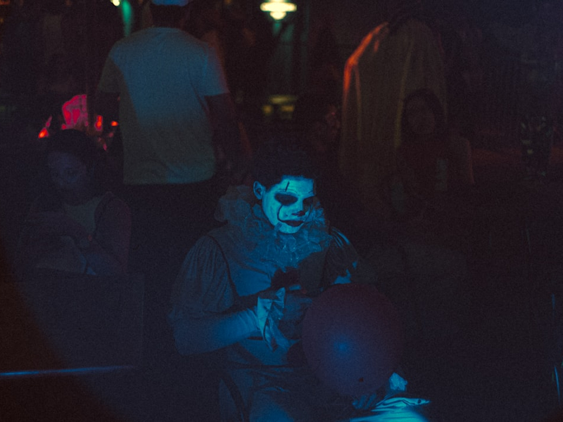 A group of people in a dark room