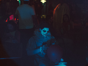 A group of people in a dark room