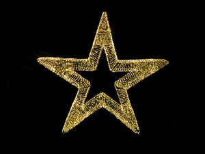 A luminous golden star with a glowing wireframe design isolated on a black background, creating a stark contrast and a sense of celebration or festivity.