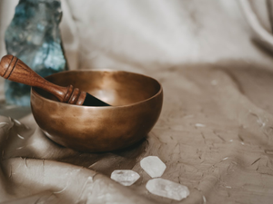 Gold Tibetan bowl for sound healing on gold texture with labradorite and quartz crystals ✦ Snag more FREE stock photos each month 👉 https://contentpixie.com/secret-snaps/