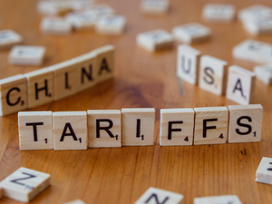A close up of scrabble tiles spelling the word china