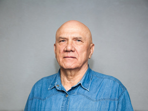 a man in a blue shirt