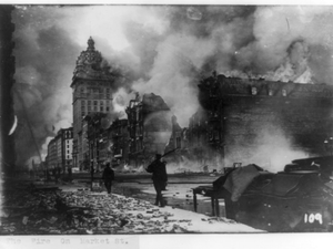 View of street in San Francisco, California, earthquake aftermath with man patrolling with gun. Circa 1906. https://www.loc.gov/resource/cph.3b42891/