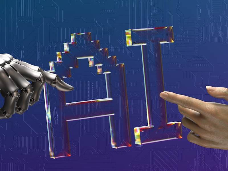 two hands touching each other in front of a blue background