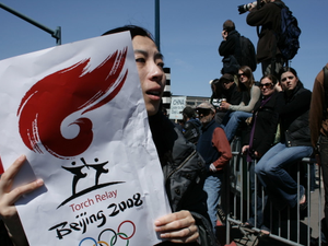 Chinese-American Woman, crying. She came out to see the torch relay in SF and ended up in the middle of political protest against China's human rights polices