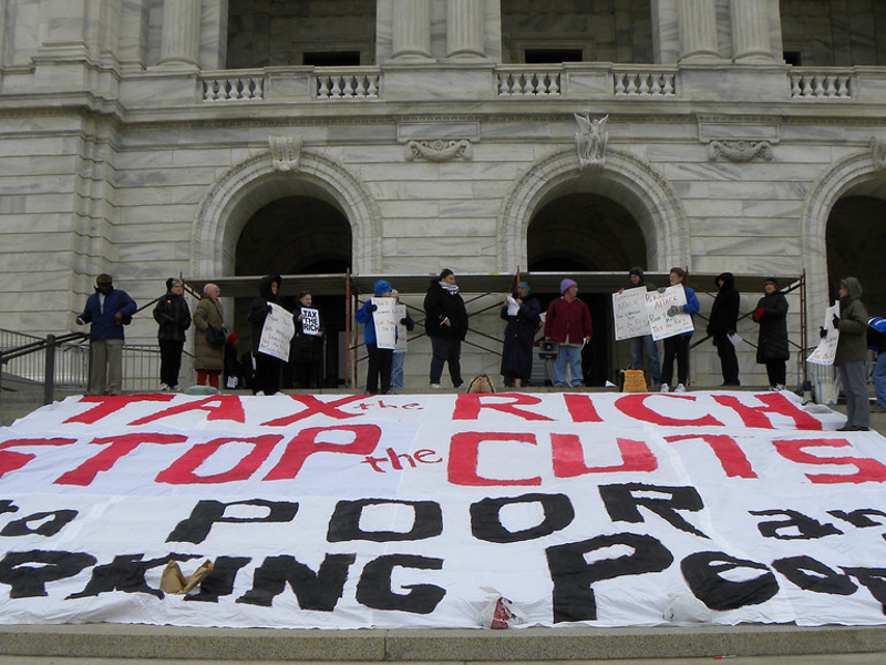 Protest to tax the rich stop cuts in social programs