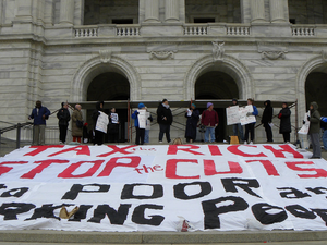 Protest to tax the rich stop cuts in social programs