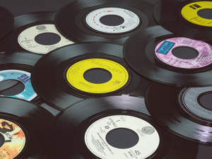 Vinyl records, 7 inch singles, 45 rpm.