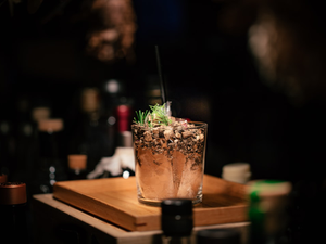 The Pimp & Sessions cocktail was created by Tomo, an overwhelmingly creative mixologist in Kyoto. It’s served in a bag and surrounded by soil and pebbles.