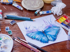 blue butterfly painted in watercolor