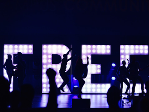 silhouette of people with free marquee letters
