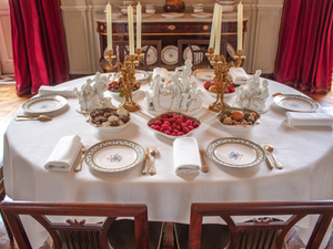 A beautifully set table prepared for a meal.