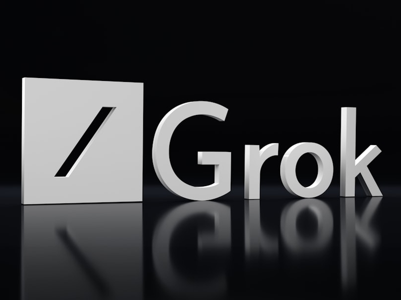 a black and white photo of the word grok