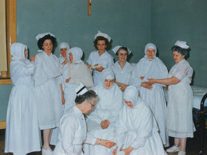 Title: Night school nursing nuns Photographer: Mitchell, Edmund L., 1905-1981 Date: March 1960 https://www.digitalcommonwealth.org/search/commonwealth:3x819770m