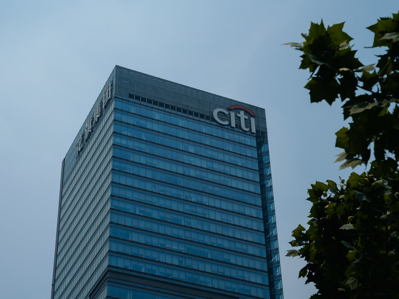 a tall building with a citi logo on it