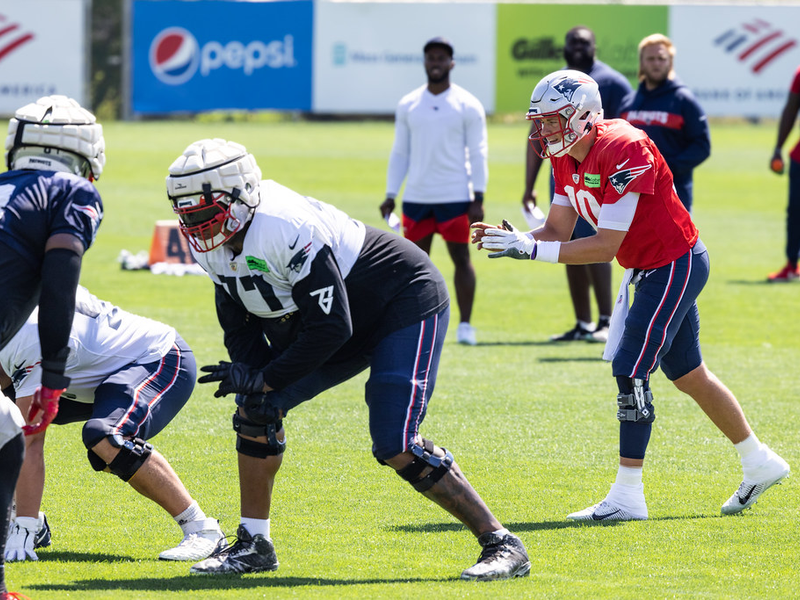 Mac Jones and Trent Brown