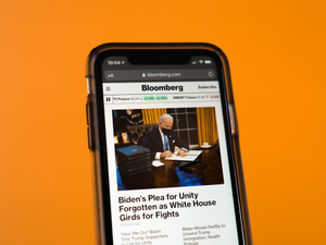 black samsung android smartphone on orange table
